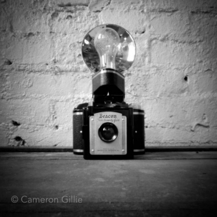 Pinhole photograph of a vintage camera.