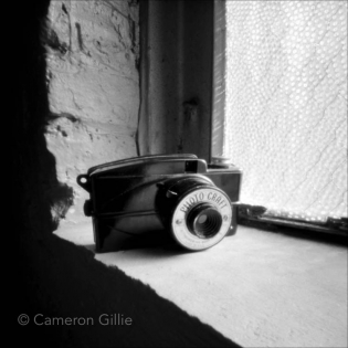 Pinhole photograph of a vintage camera.